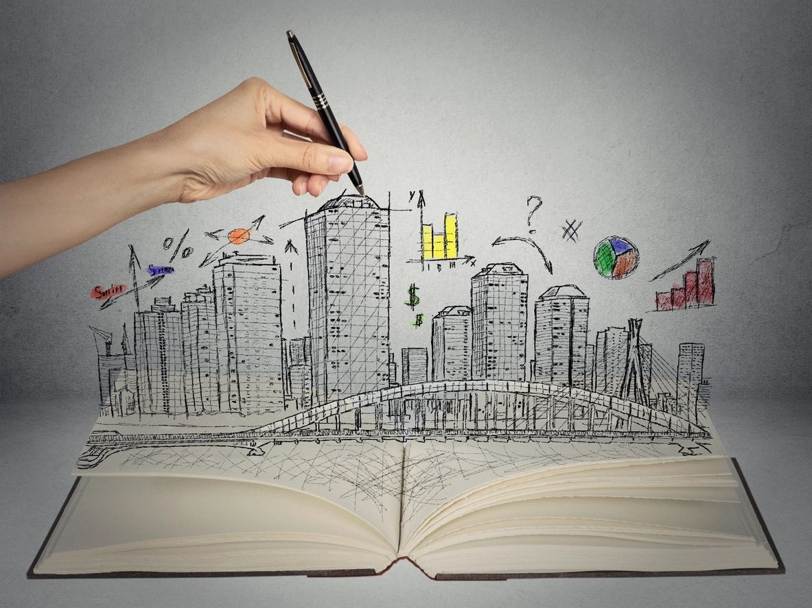 Bring Clarity to Your Projects - Hand drawing city skyline business concept growing out of open book